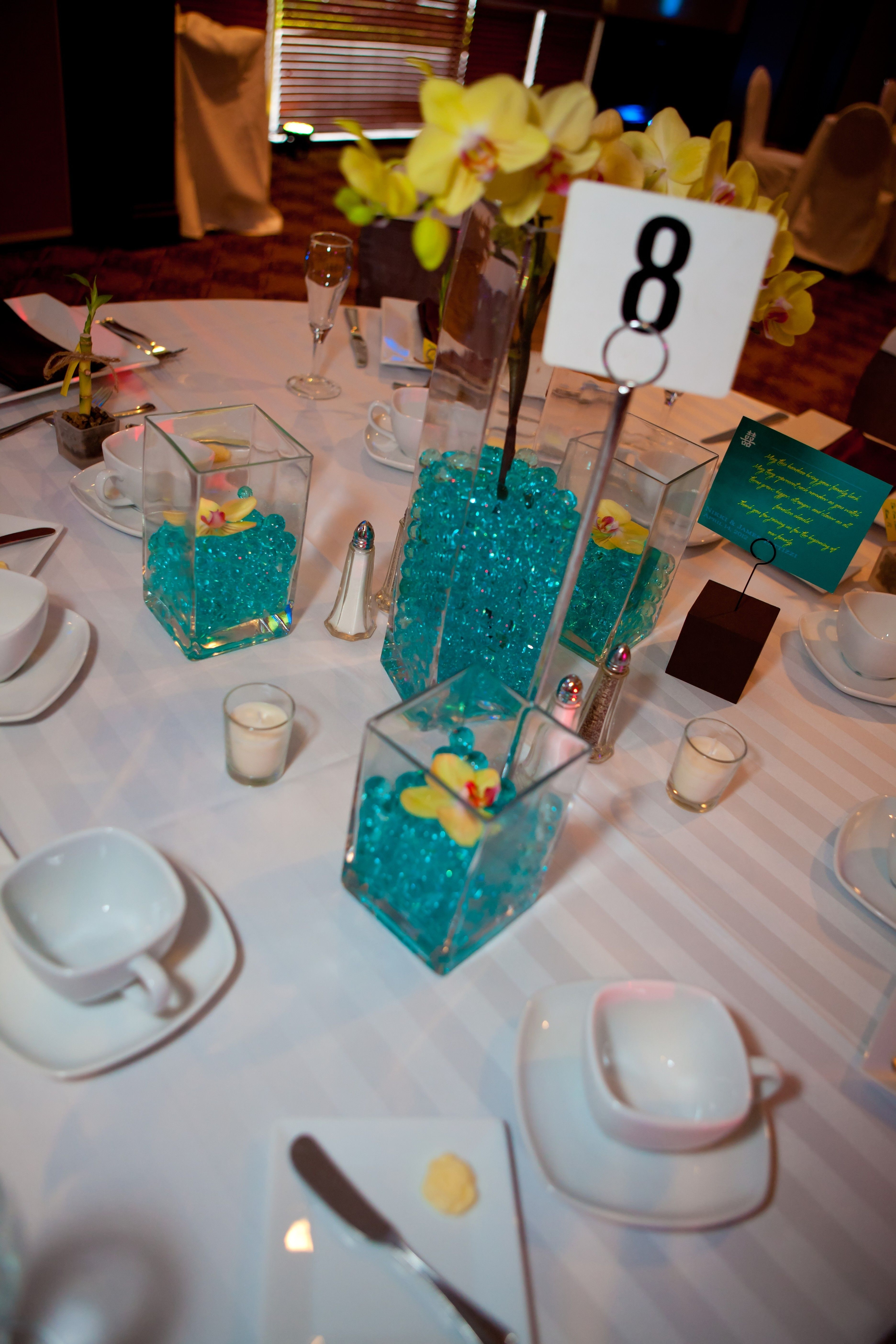 16 inch square vase of wedding centerpieces square vases teal water beads yellow inside square vases teal water beads yellow orchids candles