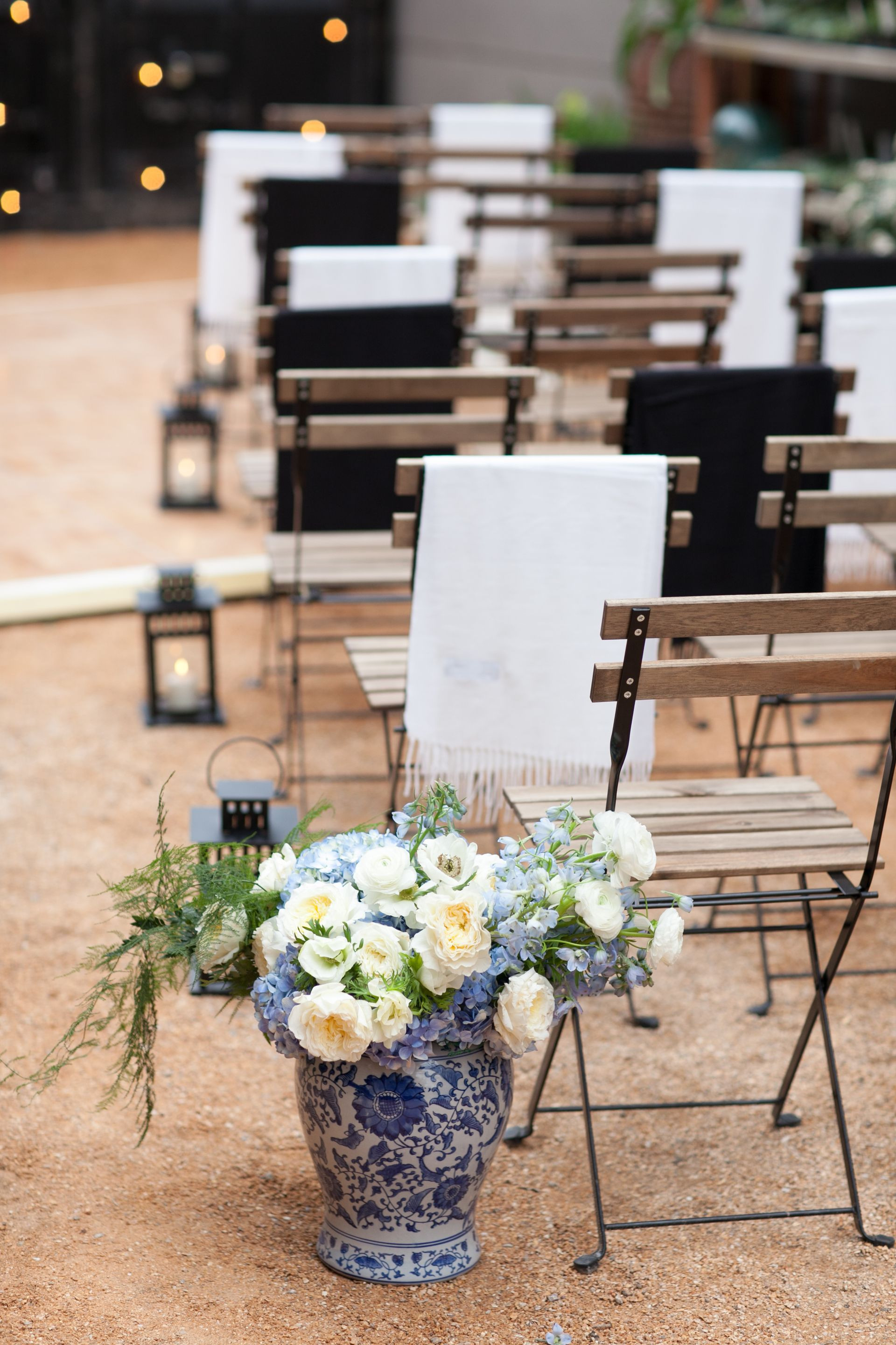blue vases for centerpieces of the smarter way to wed wedding ceremony ideas pinterest throughout outdoor wintertime wedding ceremony blue china vases cream and blue floral arrangements lanterns down the aisle shawls on chairs julie mikos