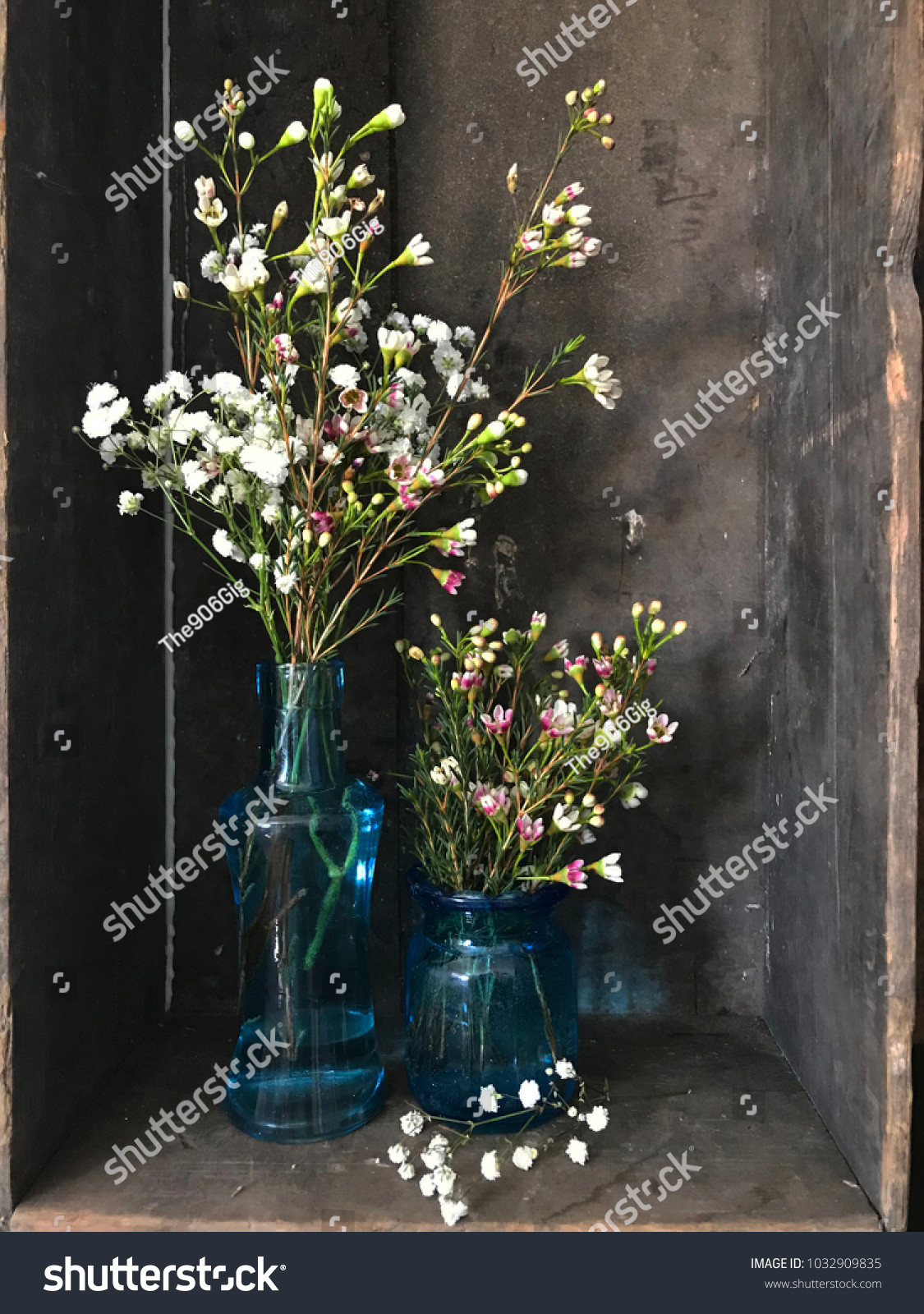 26 Cute Colored Glass Vases for Centerpieces 2024 free download colored glass vases for centerpieces of wildflowers babys breath blue glass vases stock photo edit now intended for wildflowers and babys breath in blue glass vases wood background rustic co