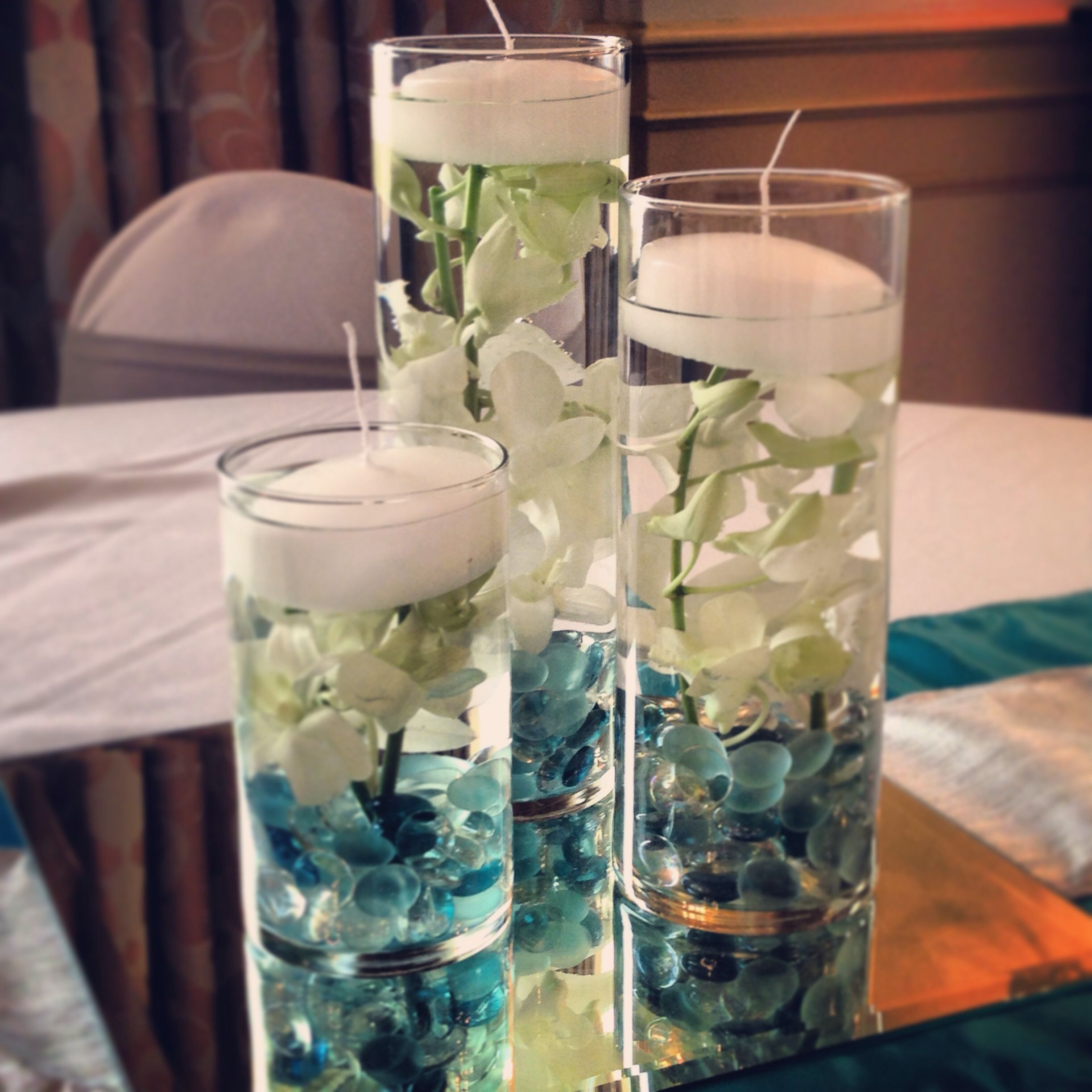 cylinder floating candle vase set of 36 of cylinder trio with submerged orchids and a floating candle set on a throughout cylinder trio with submerged orchids and a floating candle set on a tile mirror with aqua gems