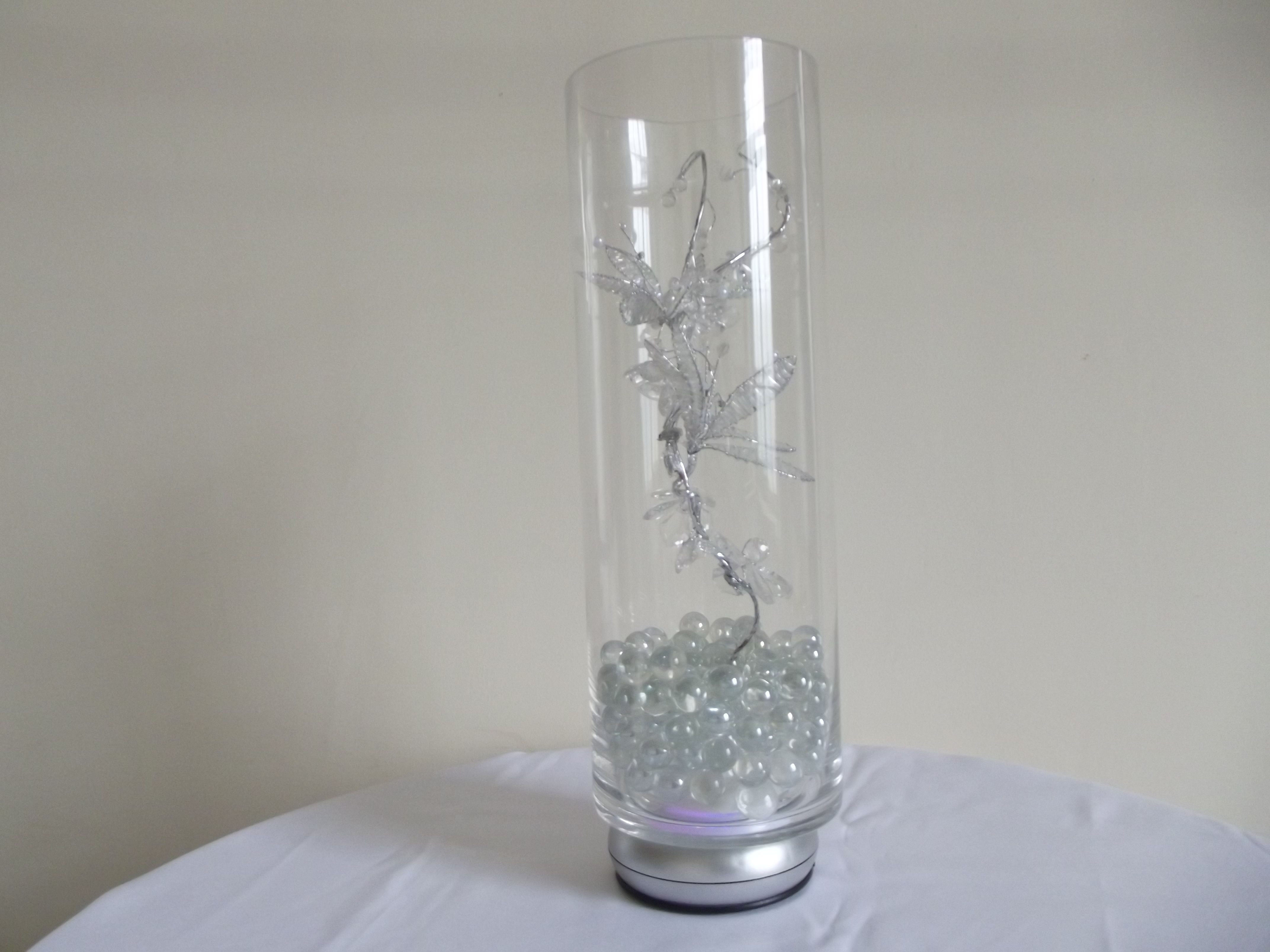 led base lights for vases of a 40cm tall vase with built in led base lights which is decorated intended for a 40cm tall vase with built in led base lights which is decorated with silver crystal and floral decoration sitting on a bed of clear crystals