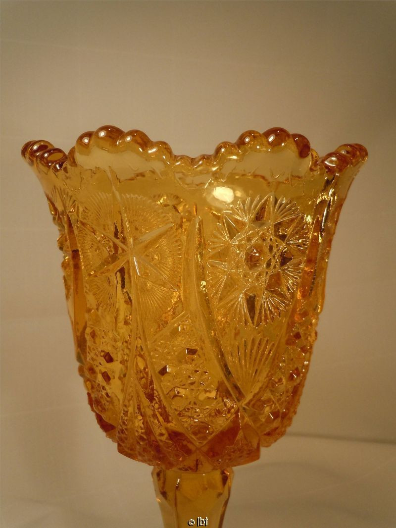 lundberg art glass vase of eapg amber gold pressed glass goblet scallop rim sawtooth starburst in base has tiny raised dots on the bottom side