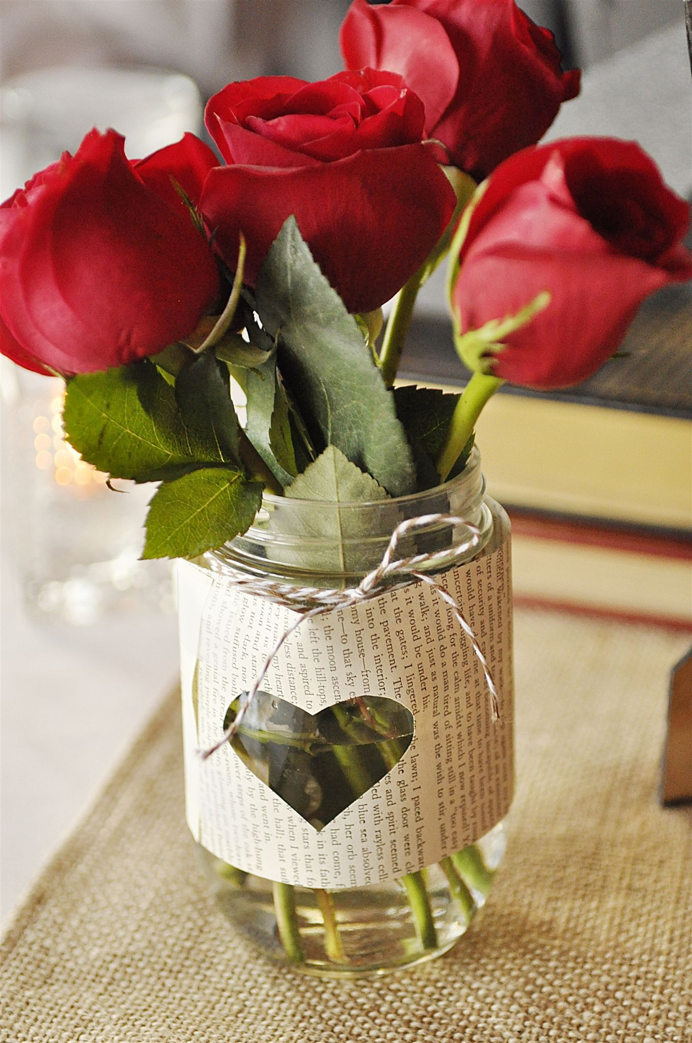 14 Perfect Vase Centerpiece Ideas for Weddings 2024 free download vase centerpiece ideas for weddings of wedding rehearsal dinnerliterary love theme vintage books books intended for vase pages from jayne eyre book used to wrap pint jar rosettes on skewer